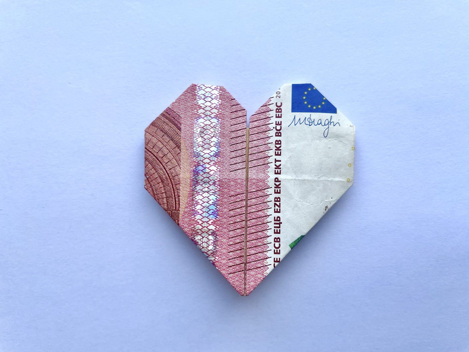 Folded Banknotes as Hearts for a Wedding
