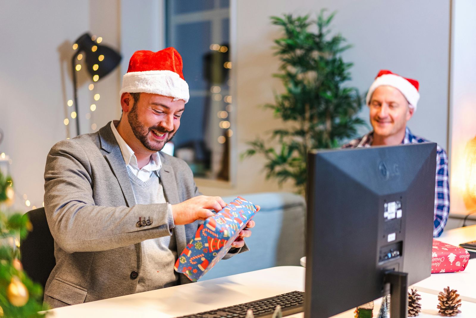 Colleagues presenting a gift in the office.